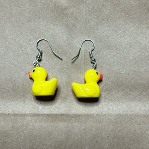 Cute little yellow duck earrings.